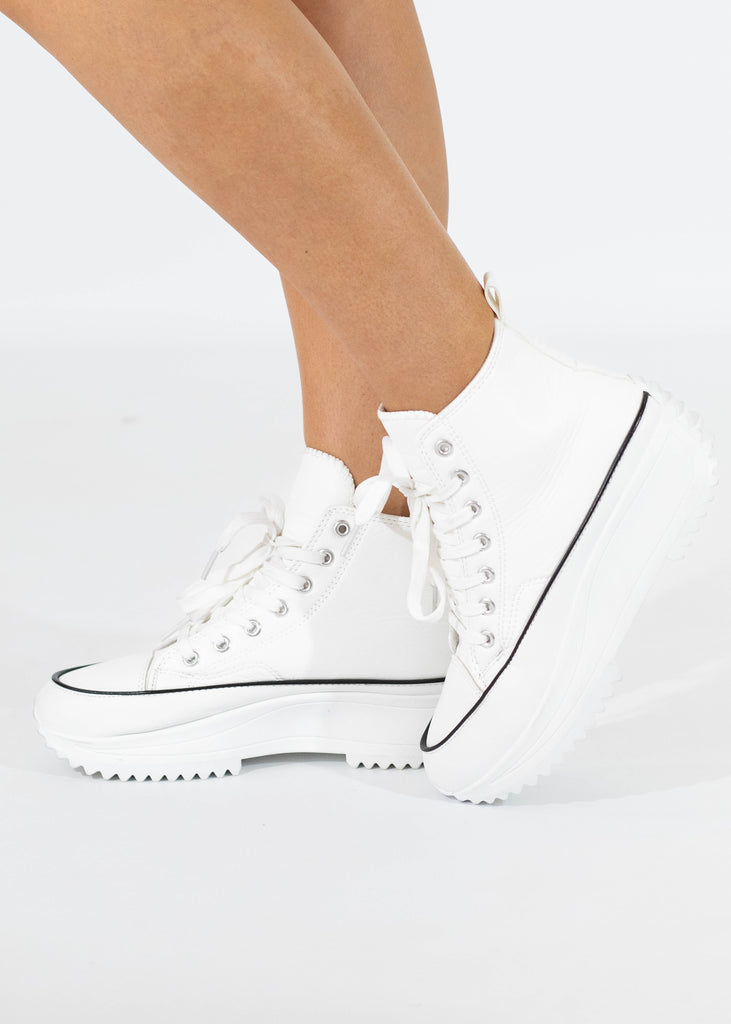 white high top sneaker with platform sole