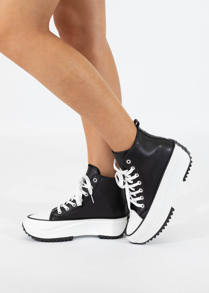 black high top sneaker with platform sole