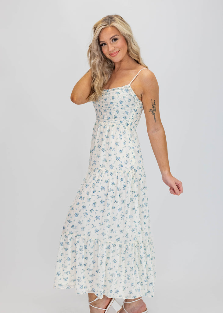 white maxi dress with dainty blue floral print