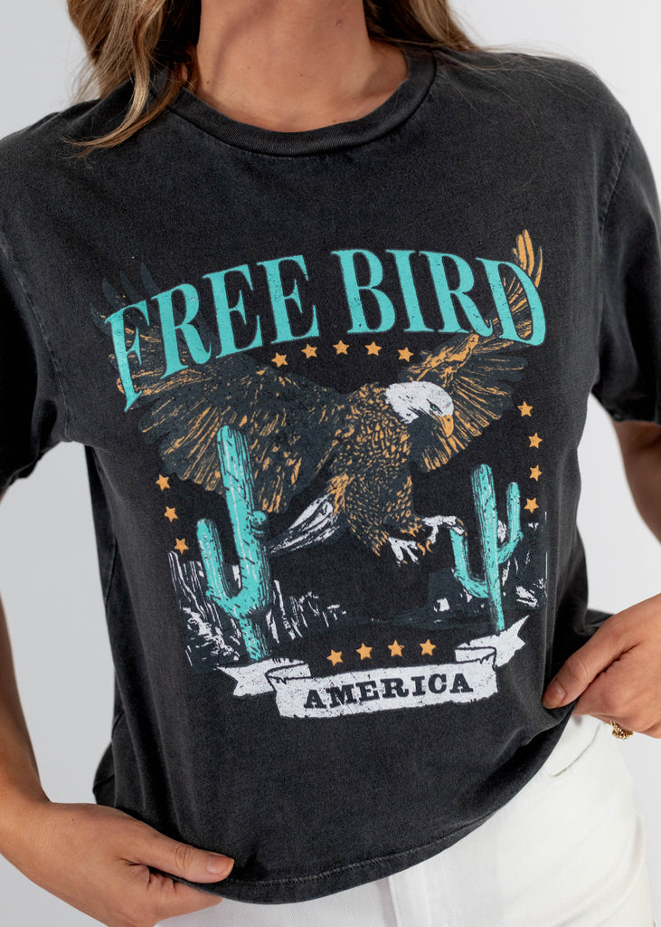 washed black tee with blue "Free Bird America" print