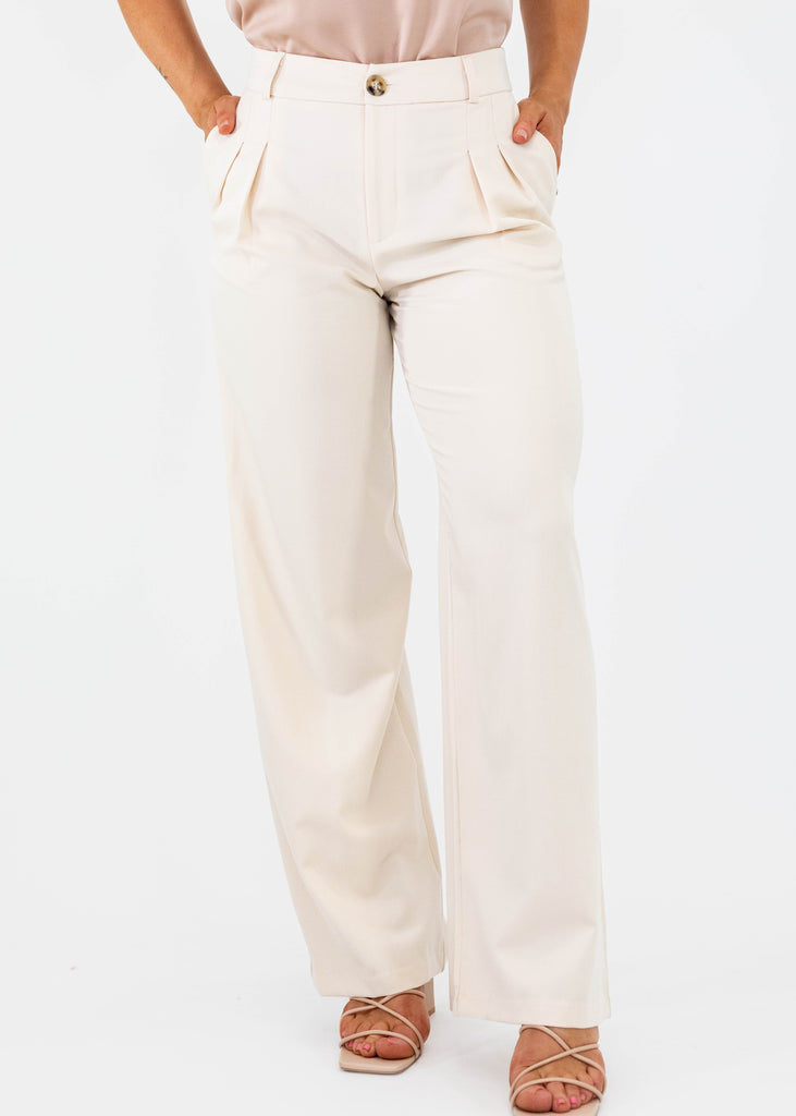 cream wide leg trousers with pleats