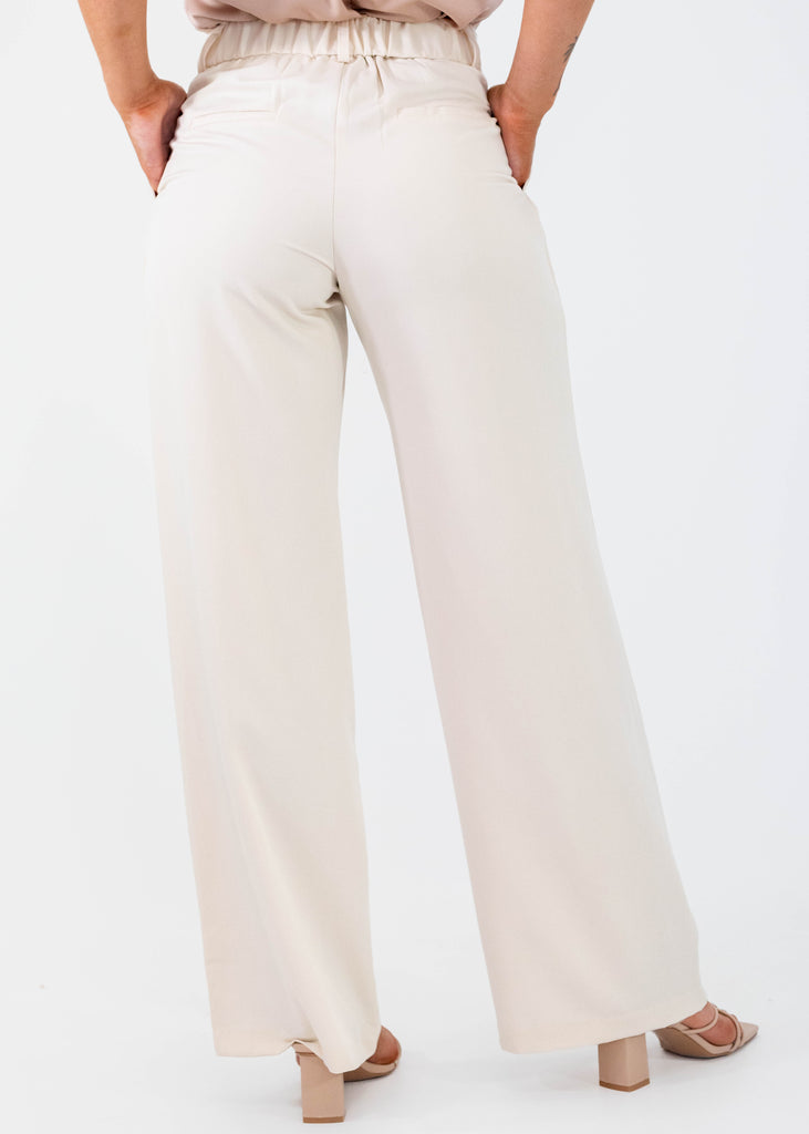 cream wide leg trousers with pleats