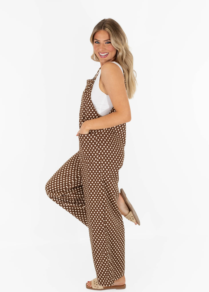brown polka dot jumpsuit with wide legs and pockets