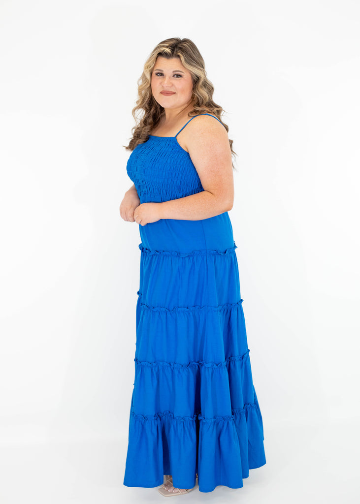 blue tiered maxi dress with a shirred chest and spaghetti straps