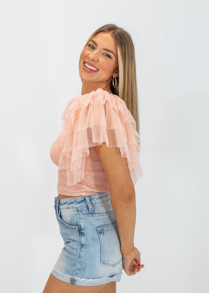 light pink tank with shirred bodice and ruffle sleeves