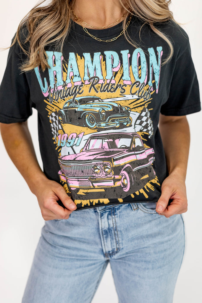 black tee with classic car graphic, light blue, yellow and pink graphic